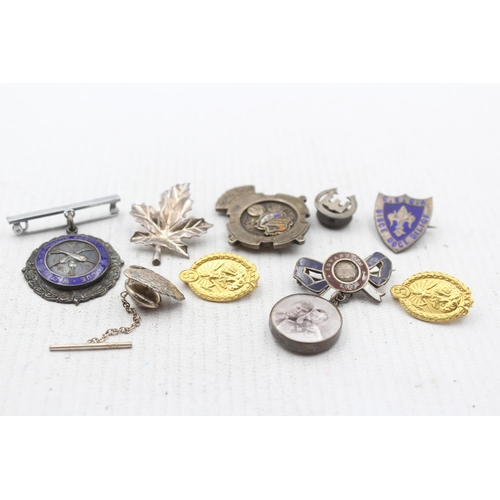 2292 - Nine hallmarked .925 silver pin badges - approx. gross weight 56g