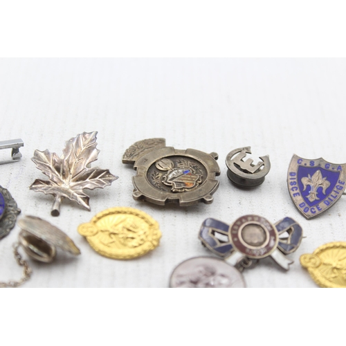 2292 - Nine hallmarked .925 silver pin badges - approx. gross weight 56g