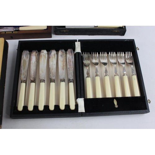 390 - Five boxed silver plated and ivorine fish cutlery sets