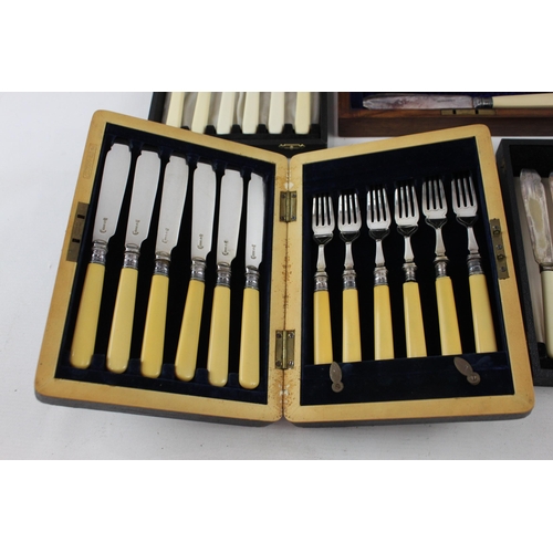 390 - Five boxed silver plated and ivorine fish cutlery sets