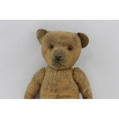 413 - A 1930s Chad Valley mohair jointed teddy bear with squeaker and glass eyes