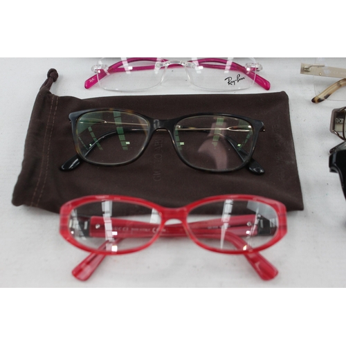 455 - A collection of spectacles to include Gucci, Ray-Ban, Versace etc.