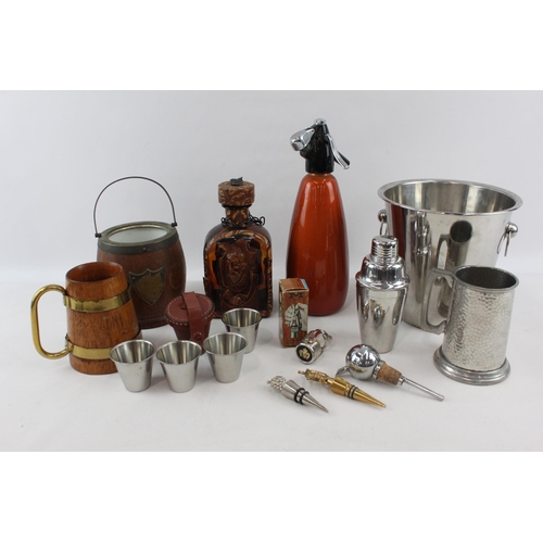 525 - A collection of breweriana to include soda syphon, ice bucket, stein etc.