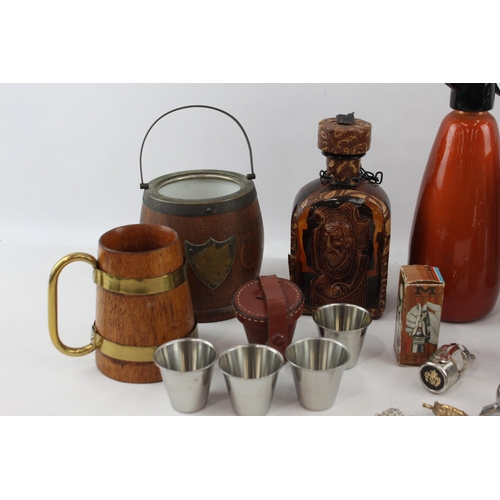 525 - A collection of breweriana to include soda syphon, ice bucket, stein etc.