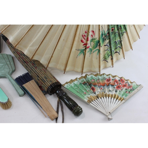 526 - A collection of vanity items to include parasol, guilloche enamel brushes etc.