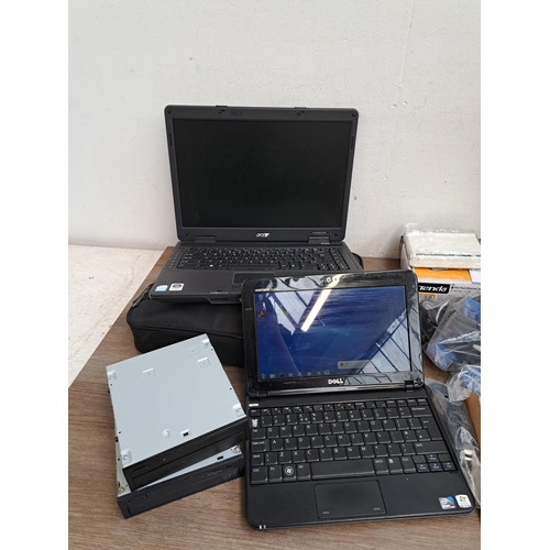 673 - A collection of computer related items to include Dell Inspiron Mini laptop, Acer TravelMate 5330 et... 