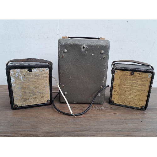 682 - Three AVO meters together with two  military issue cases, one Mk II and one other