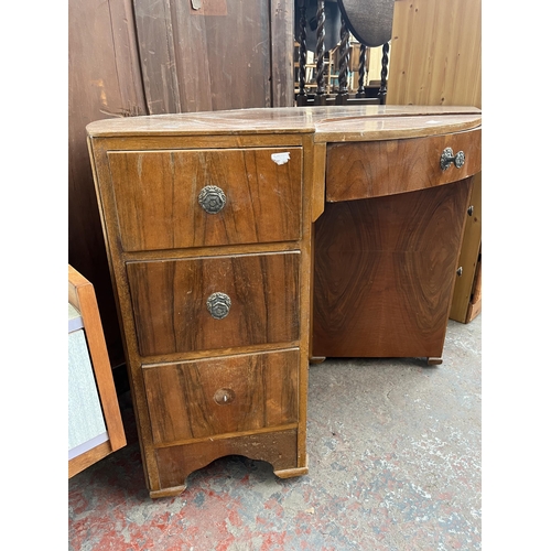 155 - An Art Deco style walnut bow fronted desk