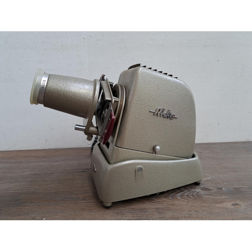 568 - A collection of photography and projection equipment to include boxed Durst F 30 enlarger with Gnome... 