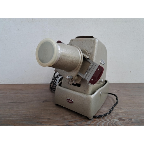 568 - A collection of photography and projection equipment to include boxed Durst F 30 enlarger with Gnome... 