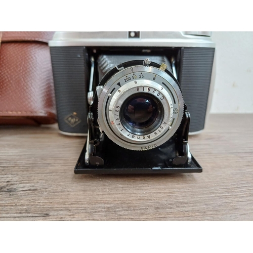 577 - A cased 1950s Agfa Isolette I folding camera fitted with Agnar 1:4.5/85 lens and Vario shutter