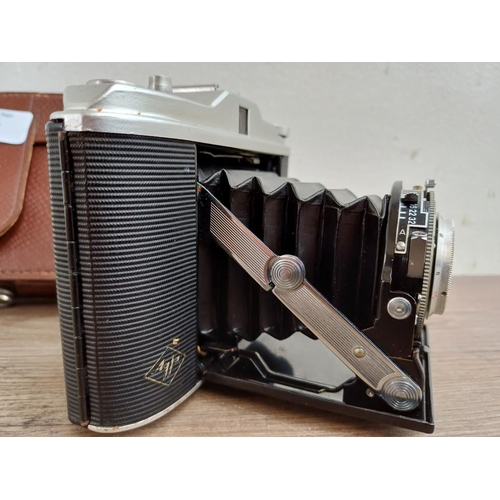 577 - A cased 1950s Agfa Isolette I folding camera fitted with Agnar 1:4.5/85 lens and Vario shutter