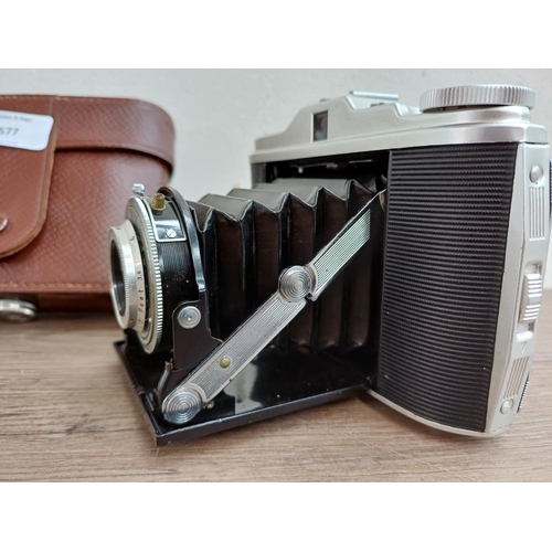 577 - A cased 1950s Agfa Isolette I folding camera fitted with Agnar 1:4.5/85 lens and Vario shutter