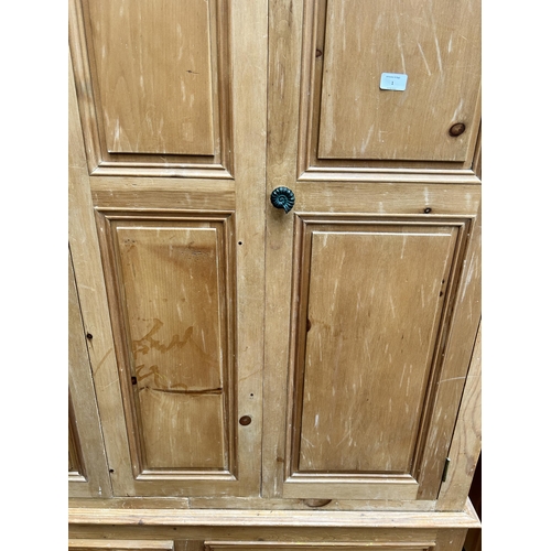 1 - A Victorian style pine double wardrobe - approx. 204cm high x 138cm wide x 65cm deep