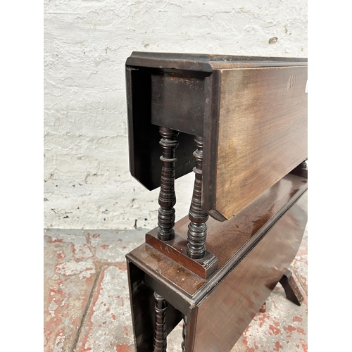 101 - A late 19th century mahogany double Sutherland table