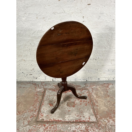 103 - A Georgian mahogany tilt top tripod pedestal circular occasional table - approx. 108cm high when til... 