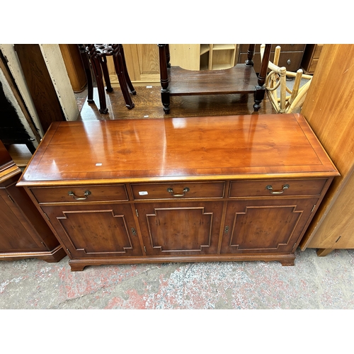 106 - A Bradley yew wood sideboard