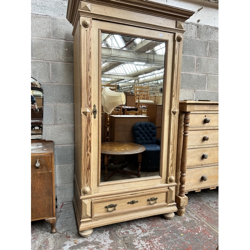 11 - A Victorian pine mirror door wardrobe - approx. 204cm high x 110cm wide x 63cm deep