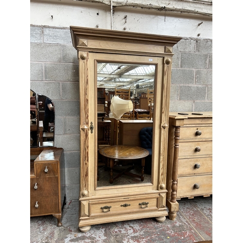 11 - A Victorian pine mirror door wardrobe - approx. 204cm high x 110cm wide x 63cm deep