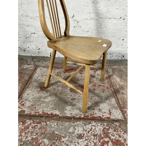 111 - A rustic elm spindle back occasional chair - approx. 75cm high