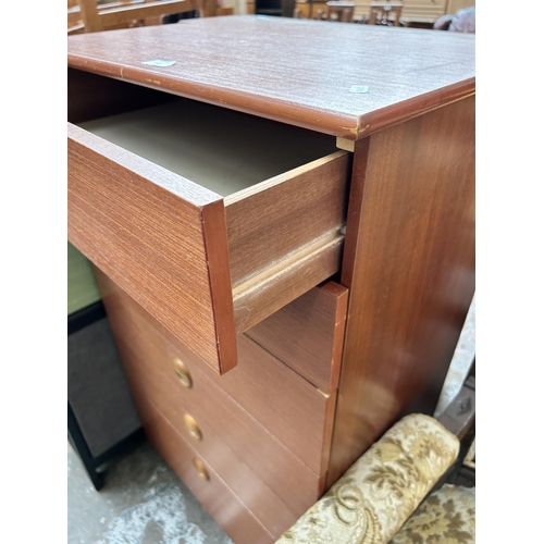 112 - A teak chest of drawers - approx. 107cm high x 61cm wide x 40cm deep