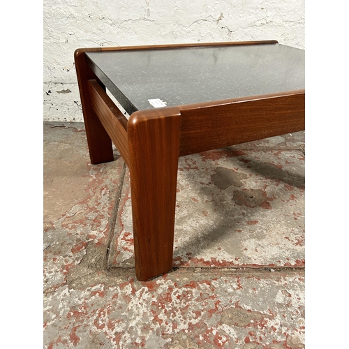 126A - A mid 20th century teak and black formica rectangular coffee table