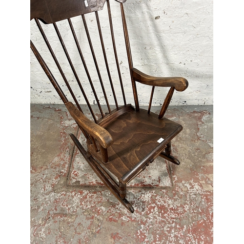 138 - A beech spindle back rocking chair