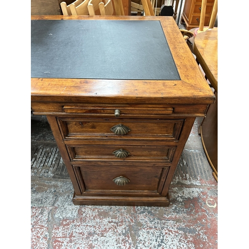 139 - A 19th century style reclaimed pine twin pedestal desk with black leather writing surface - approx. ... 