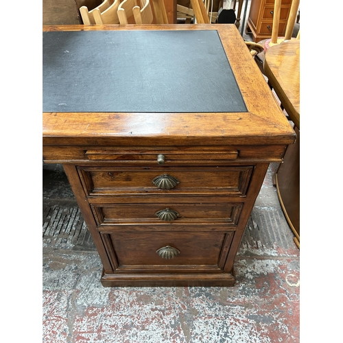 139 - A 19th century style reclaimed pine twin pedestal desk with black leather writing surface - approx. ... 