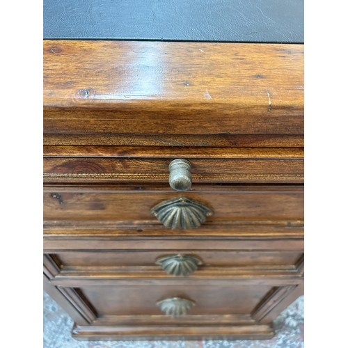 139 - A 19th century style reclaimed pine twin pedestal desk with black leather writing surface - approx. ... 