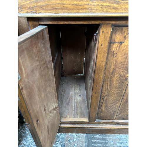 139 - A 19th century style reclaimed pine twin pedestal desk with black leather writing surface - approx. ... 