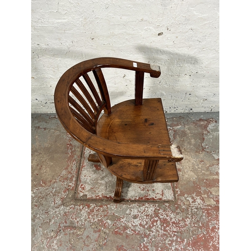 140 - A reclaimed pine captain's swivel office desk chair