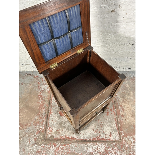 159 - A mid 20th century oak sewing cabinet on barley twist supports - approx. 73cm high x 40cm wide x 35c... 