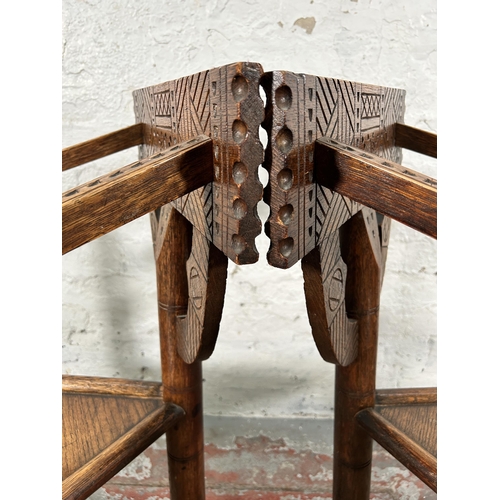 16 - A pair of 19th century hand carved oak turner's chairs