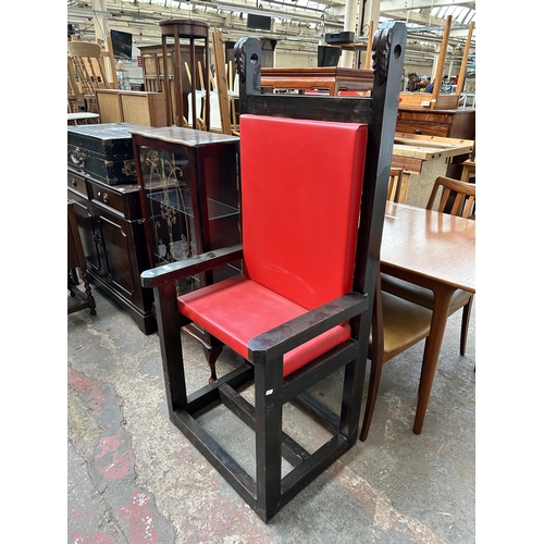 163 - A bespoke hardwood and red vinyl bondage chair