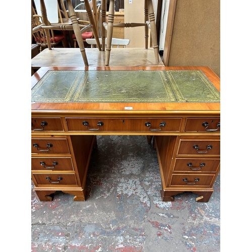 170 - A yew wood twin pedestal writing desk with green leather insert - approx. 76cm high x 122cm wide x 6... 