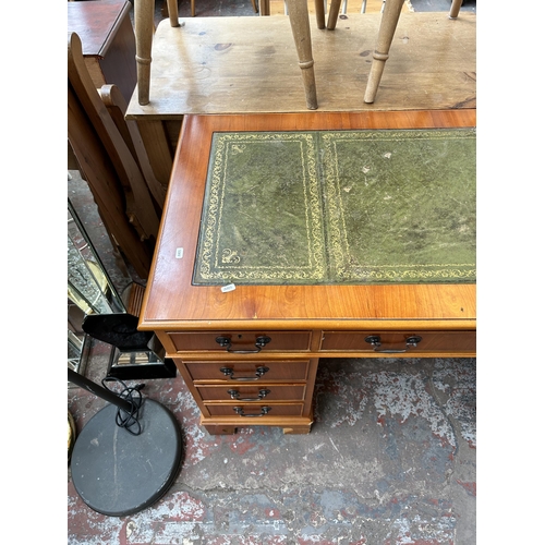 170 - A yew wood twin pedestal writing desk with green leather insert - approx. 76cm high x 122cm wide x 6... 