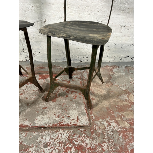 181 - A pair of 1950s Tan-Sad style fibreboard and cast metal industrial machinist's chairs