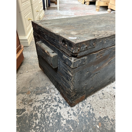 23 - A late 19th/early 20th century ebonised pine tool box - approx. 32cm high x 68cm wide x 39cm deep