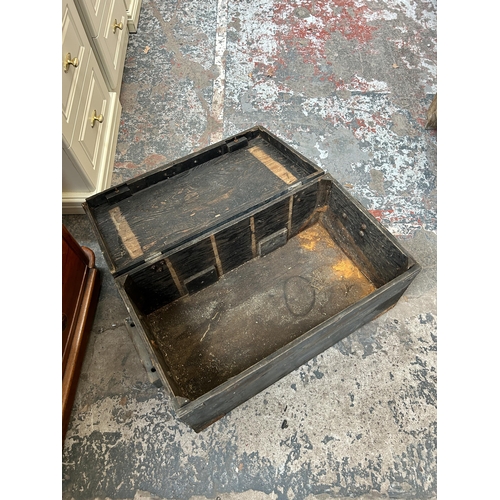 23 - A late 19th/early 20th century ebonised pine tool box - approx. 32cm high x 68cm wide x 39cm deep