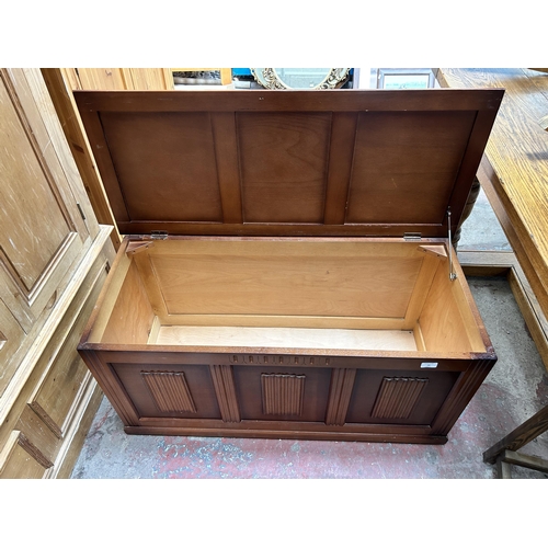 29 - A mid 20th century oak linenfold blanket box