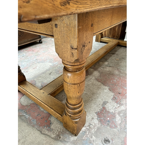 33 - A 17th century style solid oak refectory dining table - approx. 77cm high x 91cm wide x 244cm long