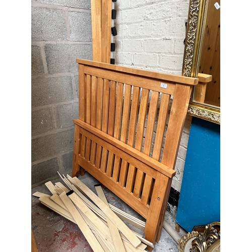 36 - A modern beech single bed frame