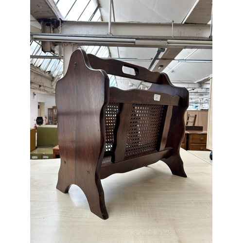 39 - A mahogany and rattan magazine rack