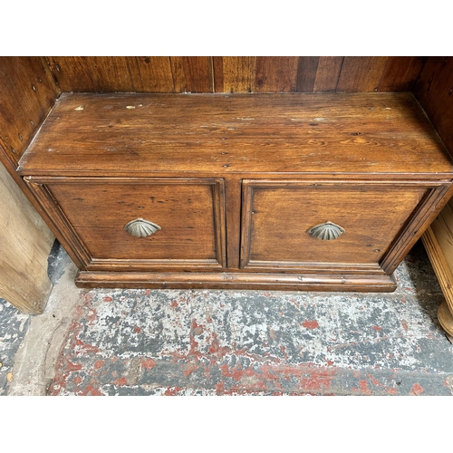 4 - A reclaimed pine boat shaped four tier bookcase - approx. 204cm high x 83cm wide x 32cm deep