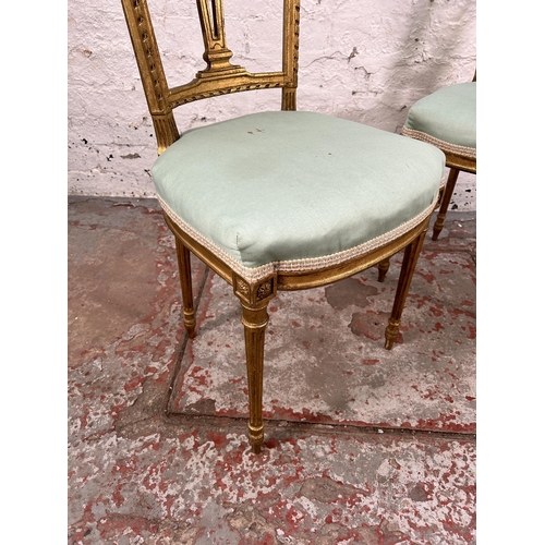 41 - A pair of late 19th/early 20th century Louis XVI style gilded and green fabric upholstered occasiona... 