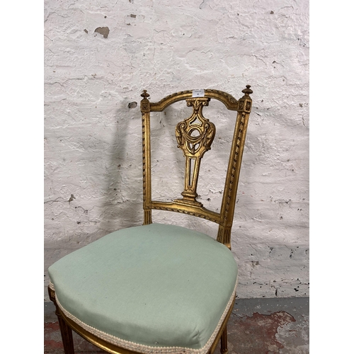 41 - A pair of late 19th/early 20th century Louis XVI style gilded and green fabric upholstered occasiona... 