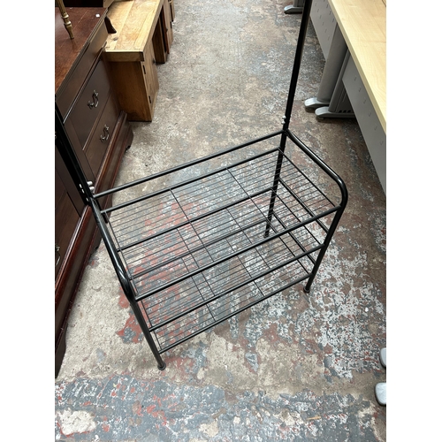 42 - A black metal hall stand - approx. 192cm high x 68cm wide x 33cm deep