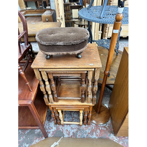 46 - Eight pieces of furniture to include oak nest of tables, beech standard lamp, two gilt framed wall m... 