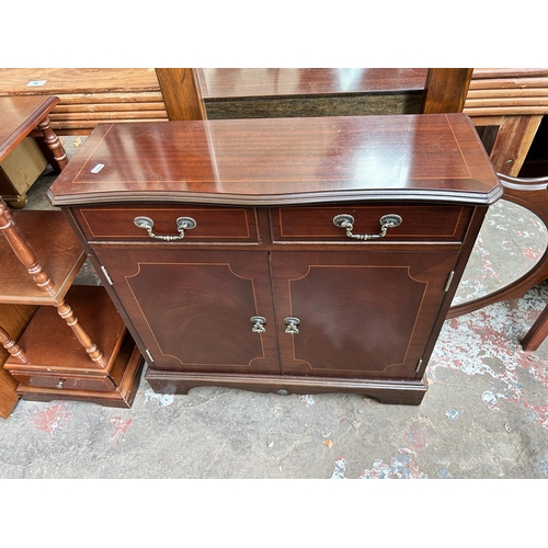 47 - Four pieces of furniture - two wall mirrors, one mahogany sideboard and one mahogany three tier side... 